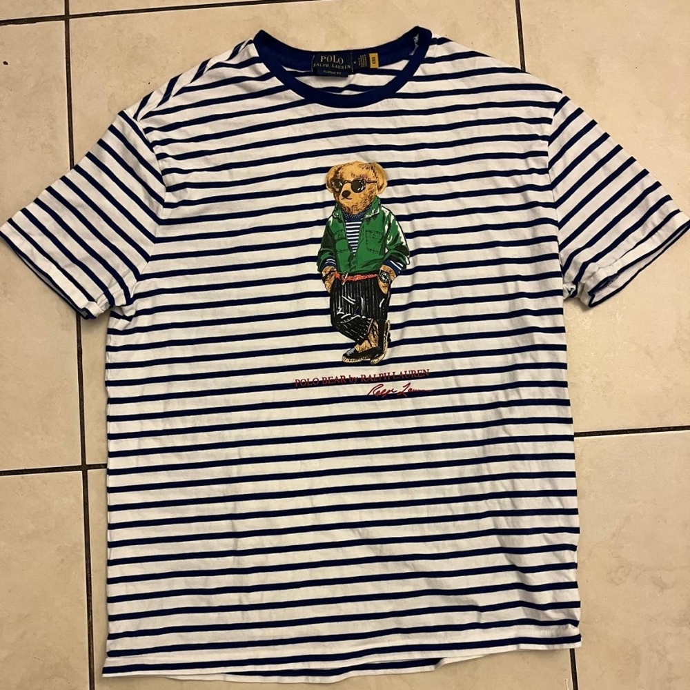 Polo Ralph Lauren mans t - shirt features classic blue and white stripes.